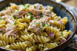 Delicious simple tuna pasta salad with fresh vegetables and herbs