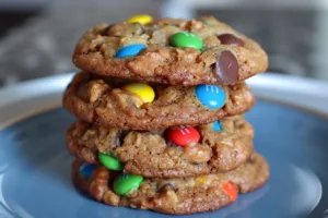 Delicious gooey monster cookies with colorful ingredients and chocolate chips