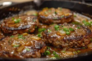 Delicious hamburger steaks served with flavorful brown gravy